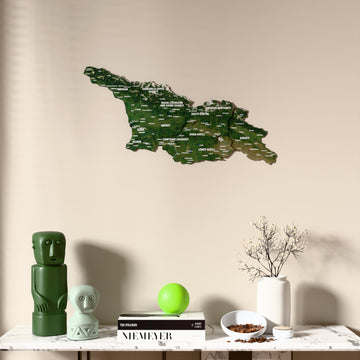 Satellite Georgia wooden wall map above a marble console, front view