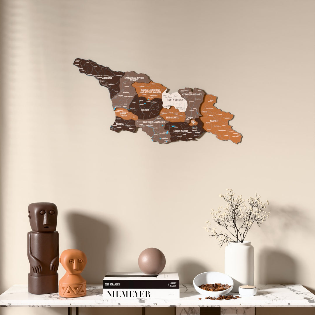 Soil Georgia wooden wall map above a marble console, front view