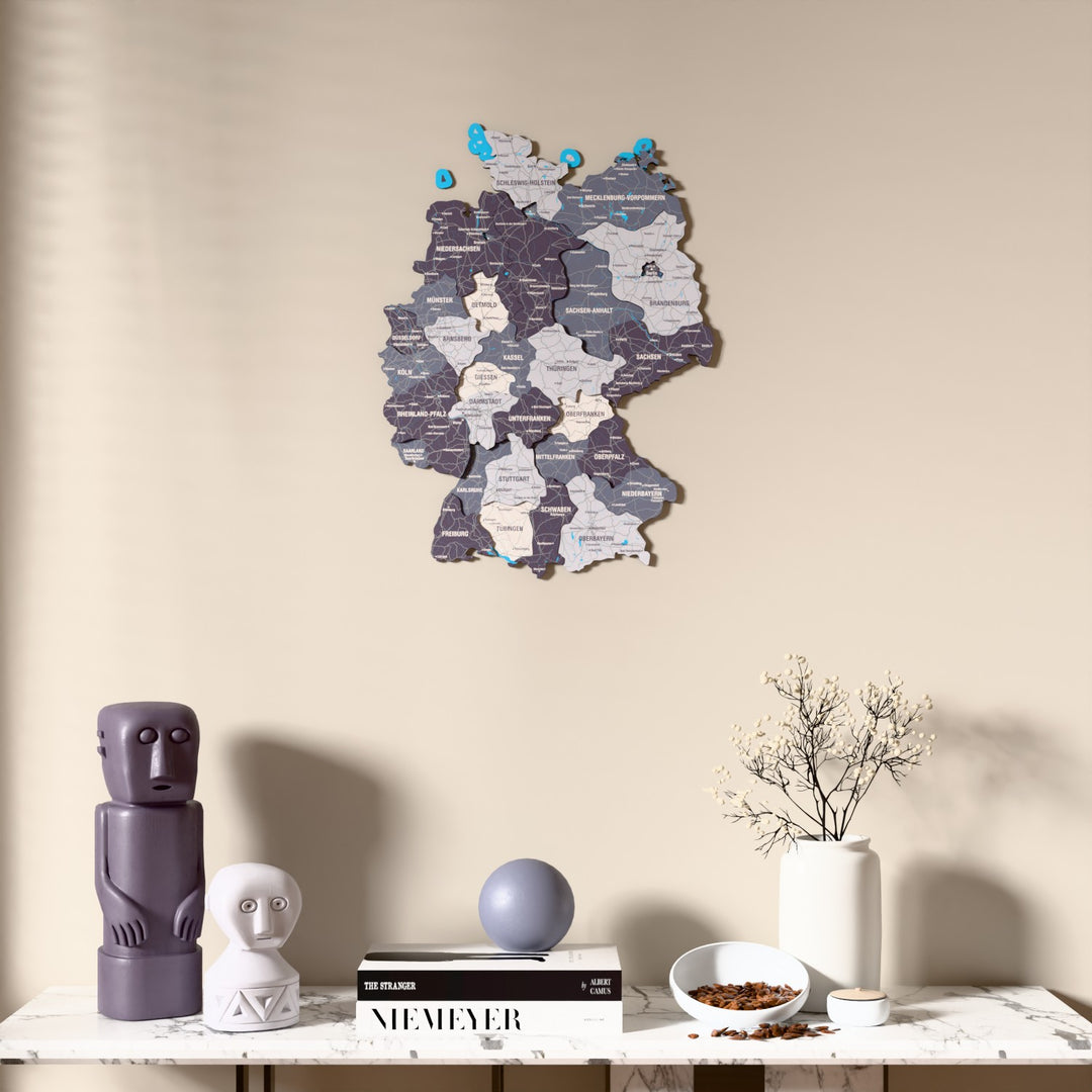 Nimbus Germany wooden wall map above a marble console, front view
