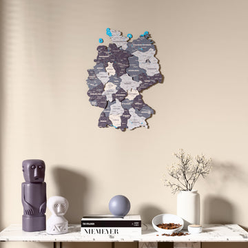 Nimbus Germany wooden wall map above a marble console, front view