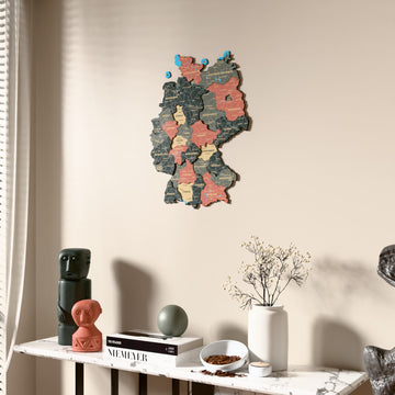 Sage Germany wooden wall map beside a sheer curtain, angled view