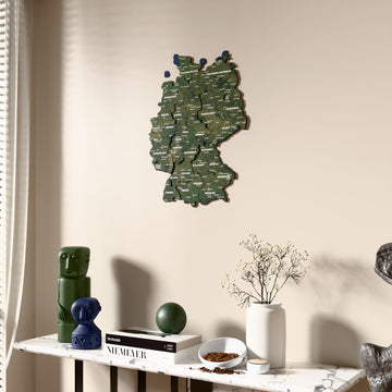 Satellite Germany wooden wall map beside a sheer curtain, angled view