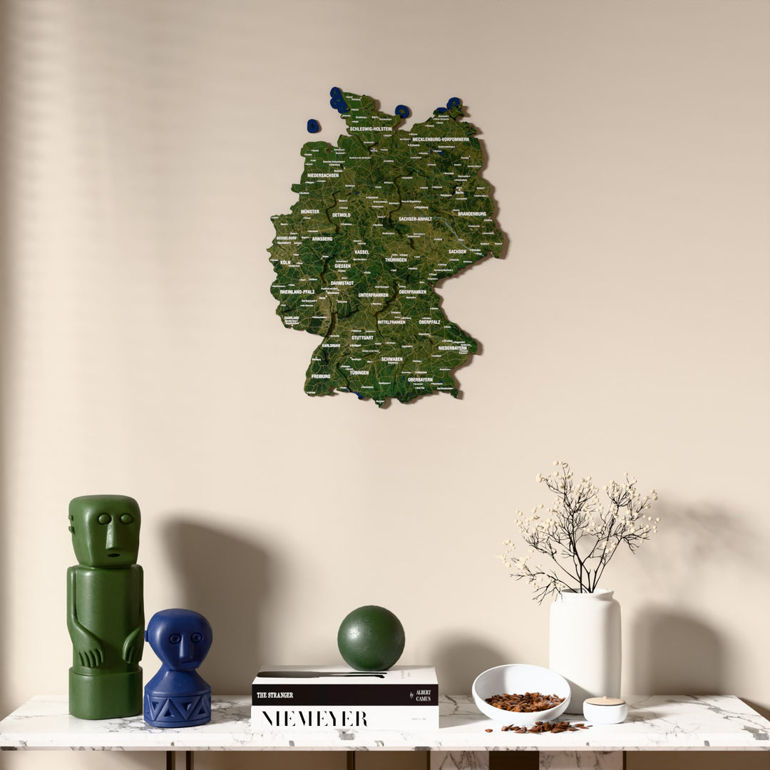 Satellite Germany wooden wall map above a marble console, front view