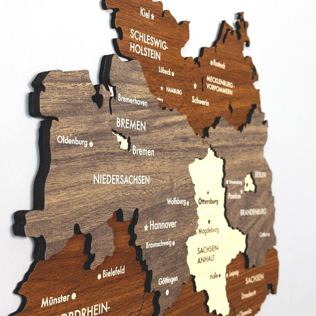 Close-up of the multilayer wooden Germany map showing Schleswig-Holstein, Bremen and Niedersachsen labels