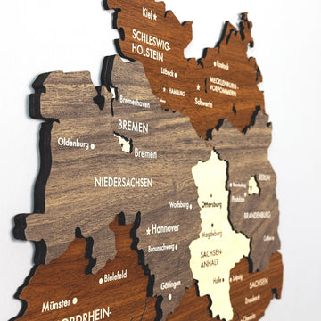 Close-up of the multilayer wooden Germany map showing Schleswig-Holstein, Bremen and Niedersachsen labels