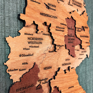 Close-up of Nordrhein-Westfalen, Hessen and Sachsen-Anhalt on the wooden Germany map