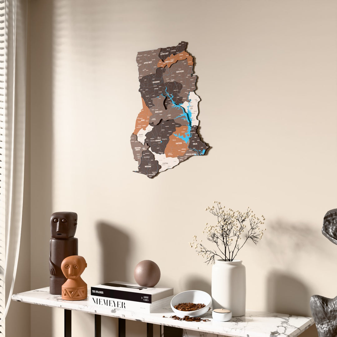 Soil Ghana wooden wall map beside a sheer curtain, angled view