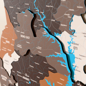 Close-up of the Soil Ghana wooden wall map with layered regions and printed names