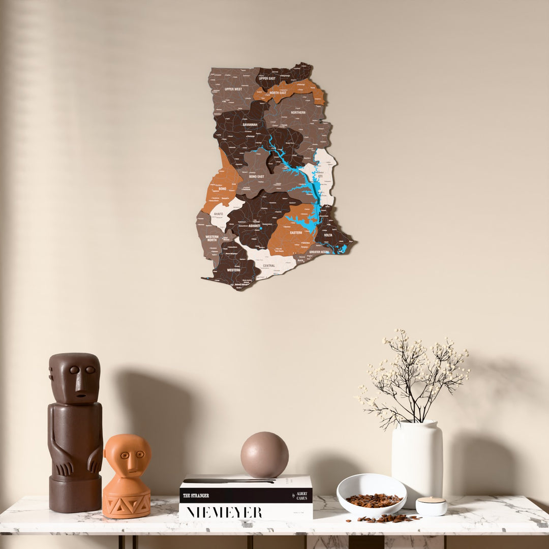 Soil Ghana wooden wall map above a marble console, front view