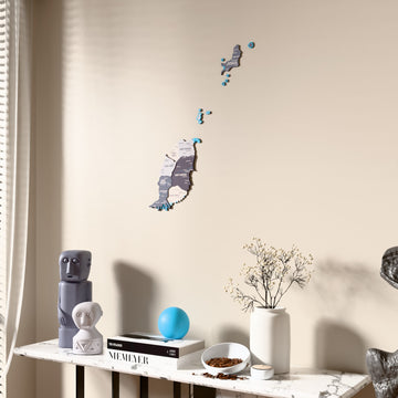 Nimbus Grenada wooden wall map beside a sheer curtain, angled view