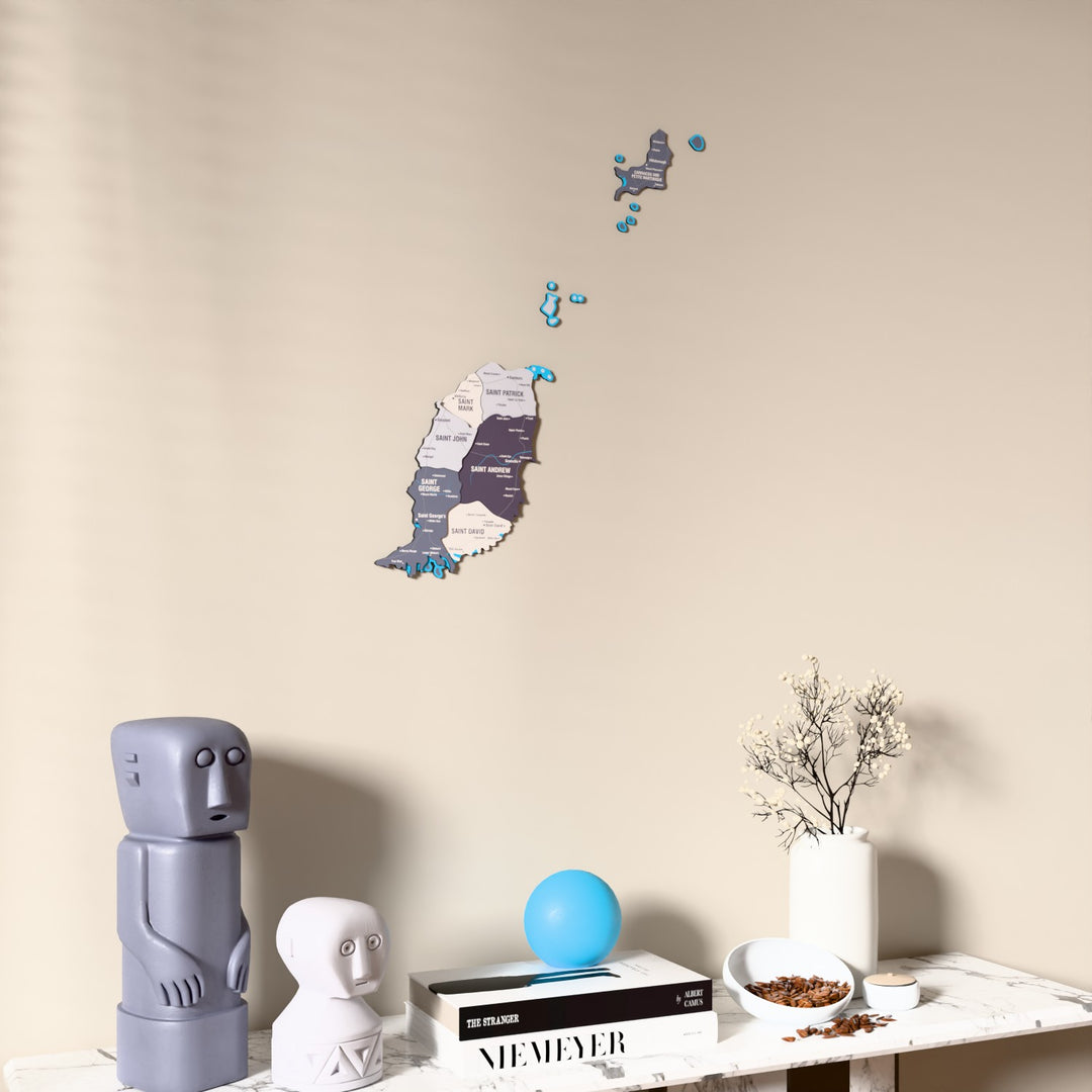 Nimbus Grenada wooden wall map on a beige wall above a console with figurines