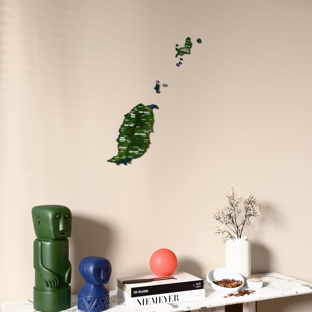 Satellite Grenada wooden wall map on a beige wall above a console with figurines