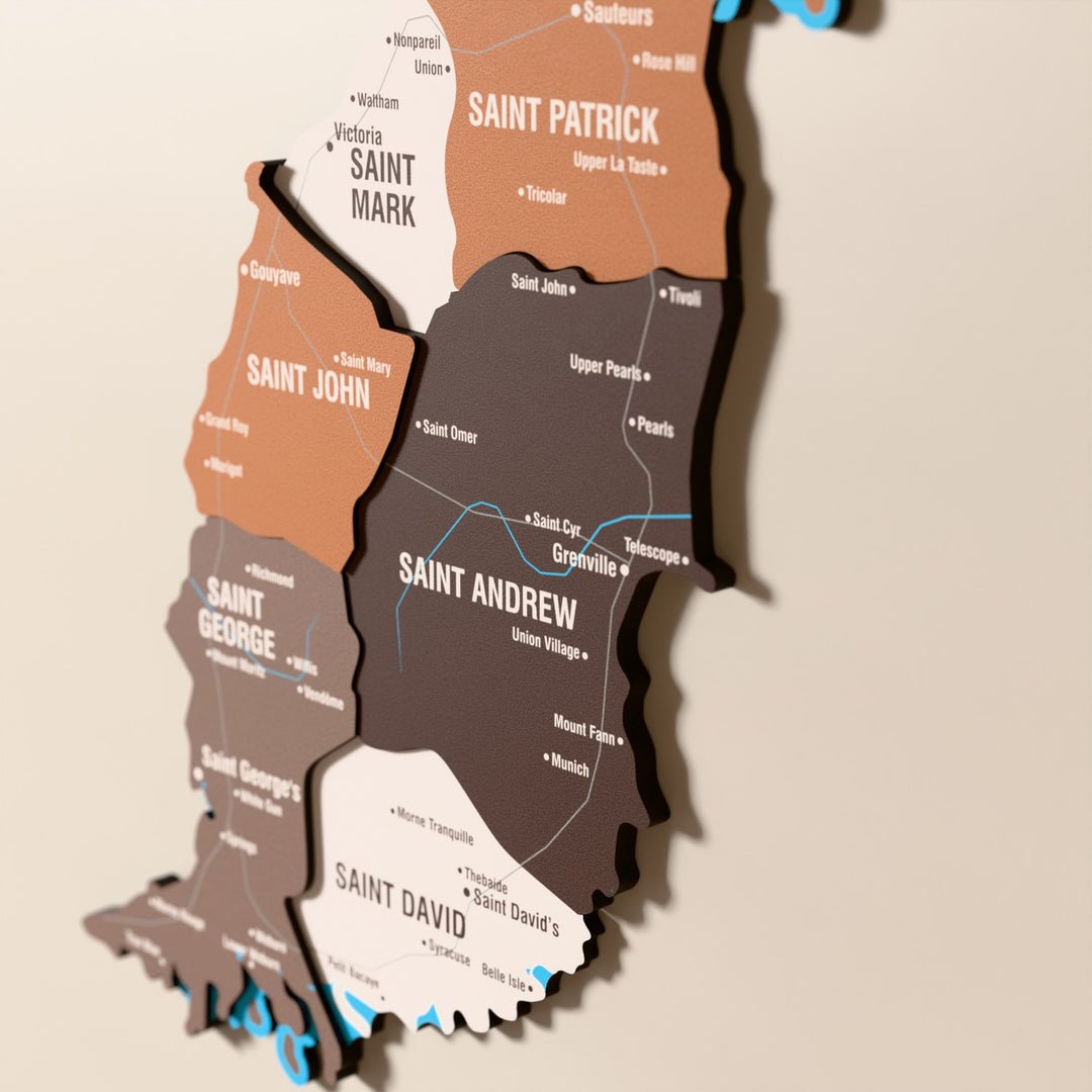 Close-up of the Soil Grenada wooden wall map with layered regions and printed names