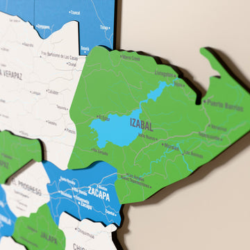 Close-up of the Flag colored Guatemala wooden wall map with layered regions and printed names