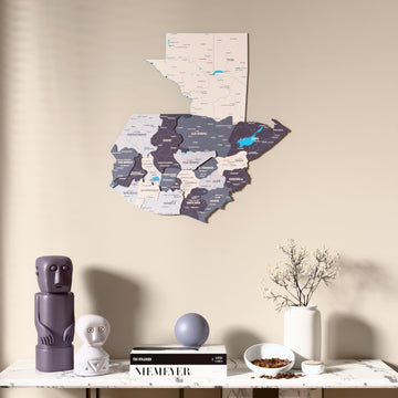 Nimbus Guatemala wooden wall map above a marble console, front view