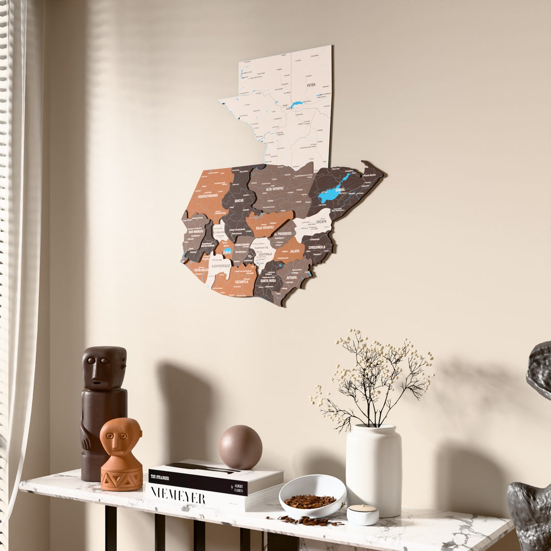 Soil Guatemala wooden wall map beside a sheer curtain, angled view