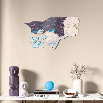 Nimbus Guinea-Bissau wooden wall map above a marble console, front view