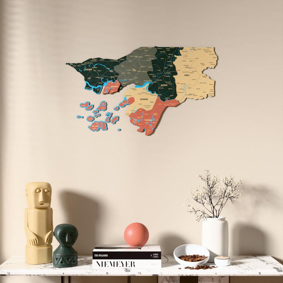 Sage Guinea-Bissau wooden wall map above a marble console, front view
