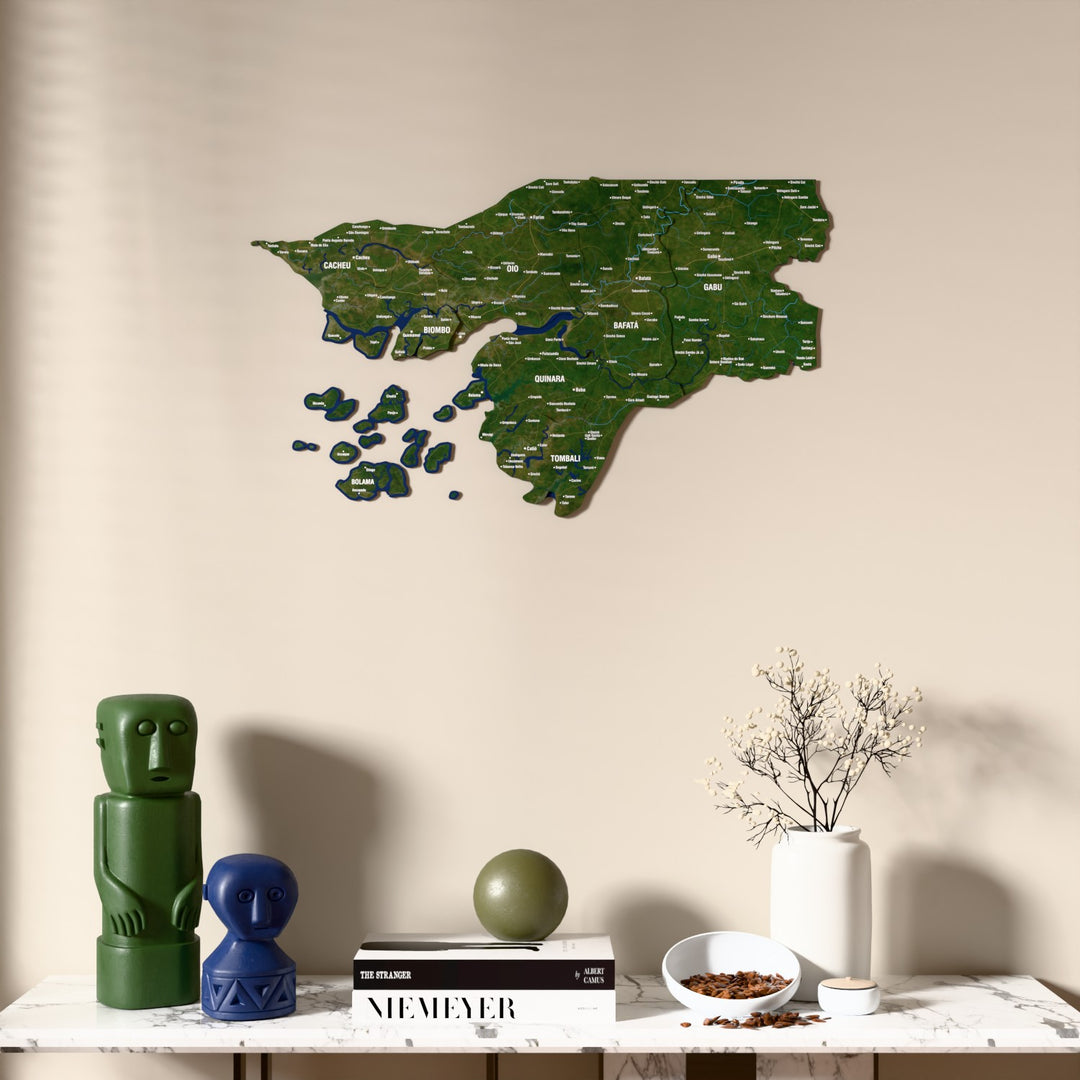 Satellite Guinea-Bissau wooden wall map above a marble console, front view
