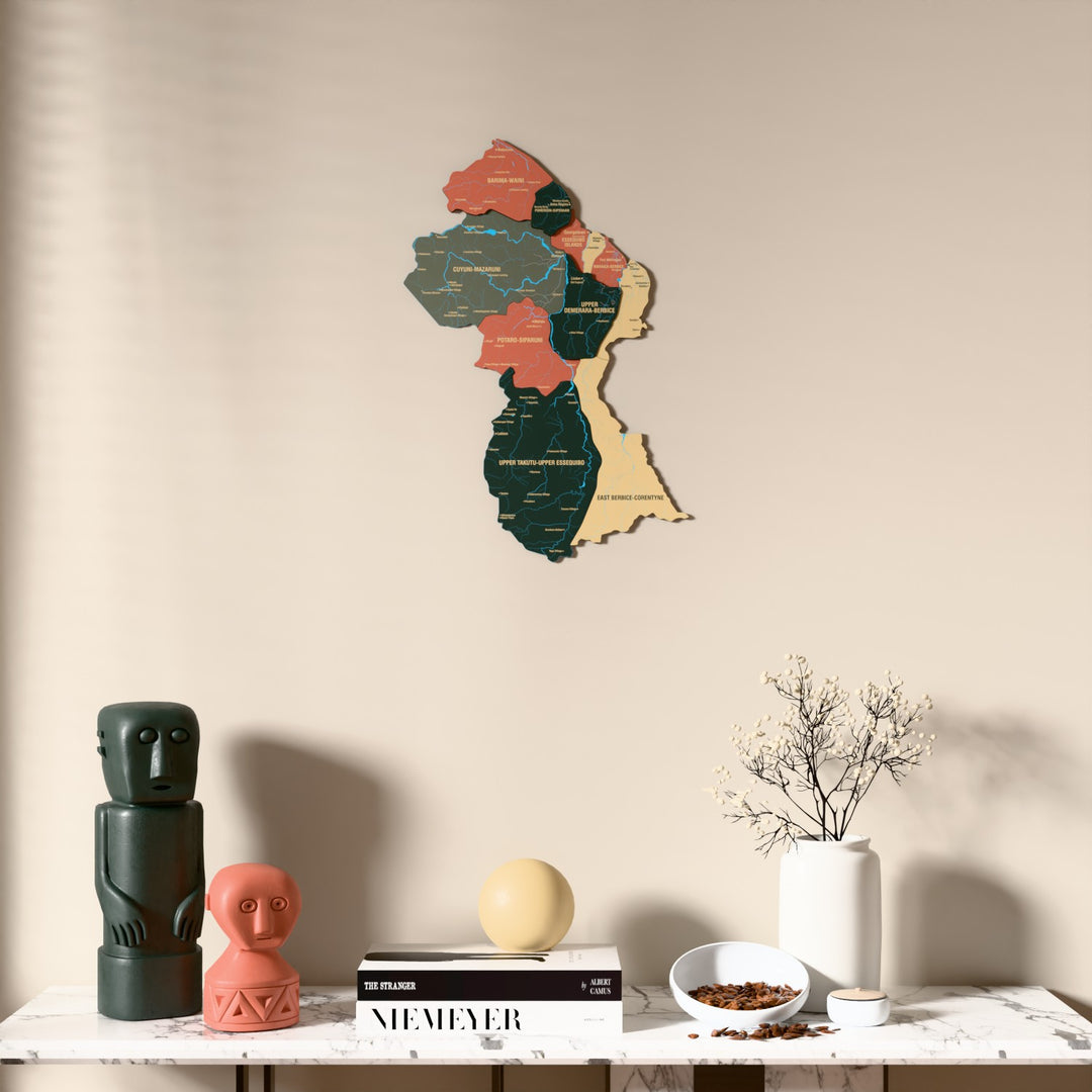 Sage Guyana wooden wall map above a marble console, front view