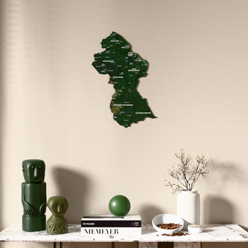 Satellite Guyana wooden wall map above a marble console, front view