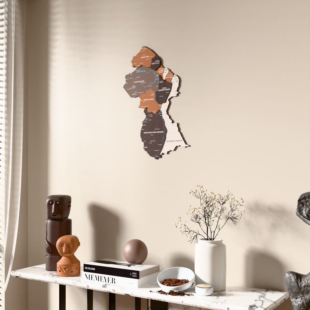 Soil Guyana wooden wall map beside a sheer curtain, angled view