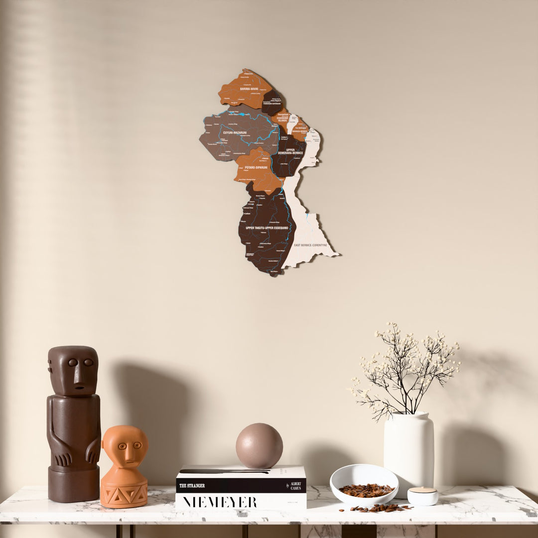 Soil Guyana wooden wall map above a marble console, front view
