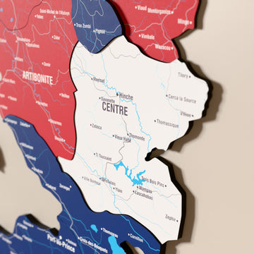 Close-up of the Flag colored Haiti wooden wall map with layered regions and printed names