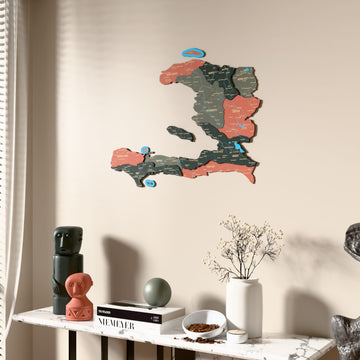 Sage Haiti wooden wall map beside a sheer curtain, angled view