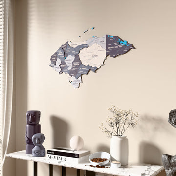 Nimbus Honduras wooden wall map beside a sheer curtain, angled view