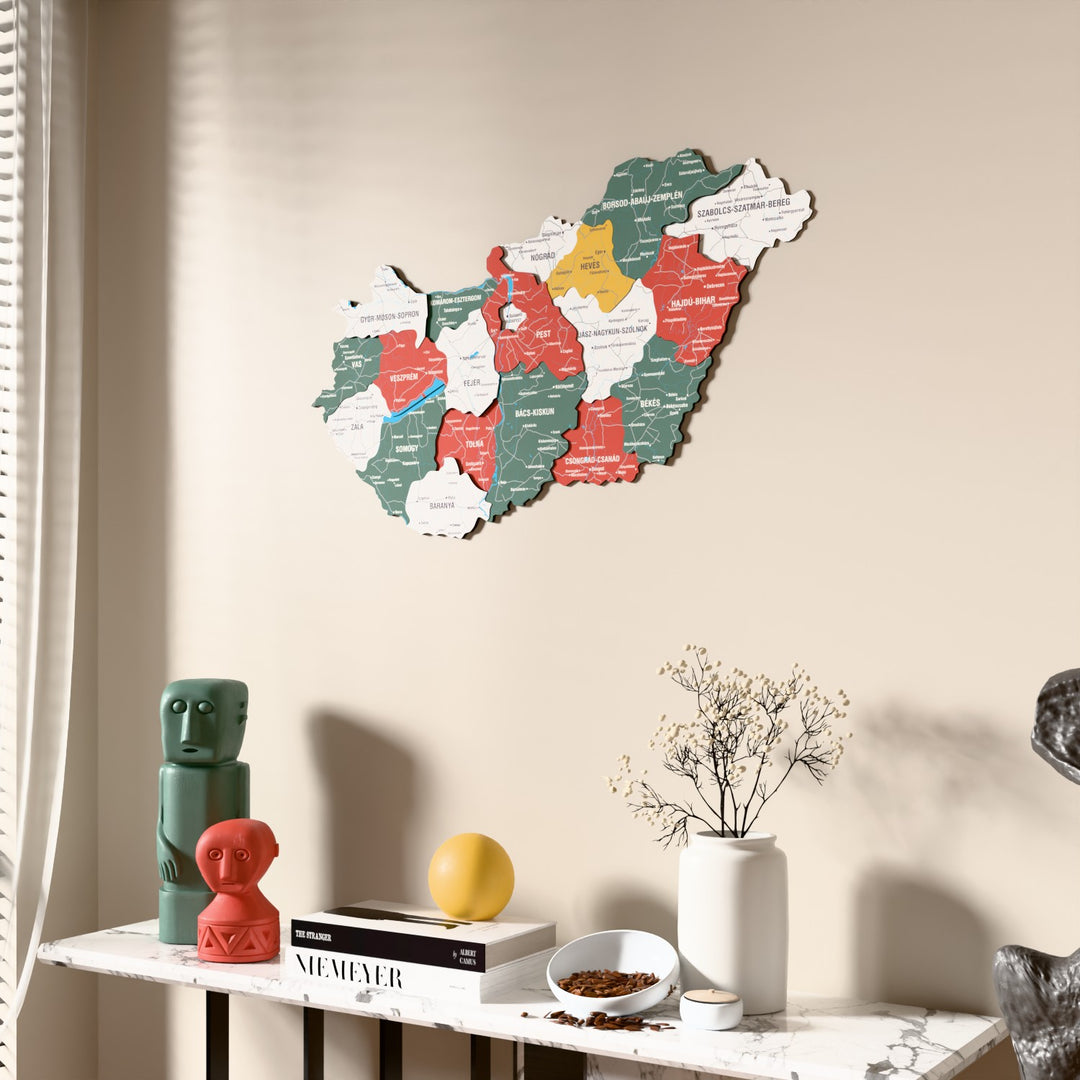 Flag colored Hungary wooden wall map beside a sheer curtain, angled view