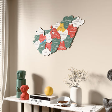 Flag colored Hungary wooden wall map beside a sheer curtain, angled view