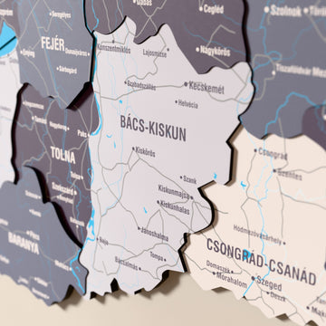 Close-up of the Nimbus Hungary wooden wall map with layered regions and printed names