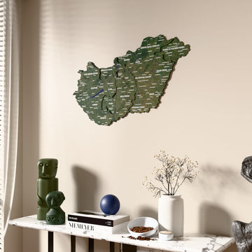 Satellite Hungary wooden wall map beside a sheer curtain, angled view