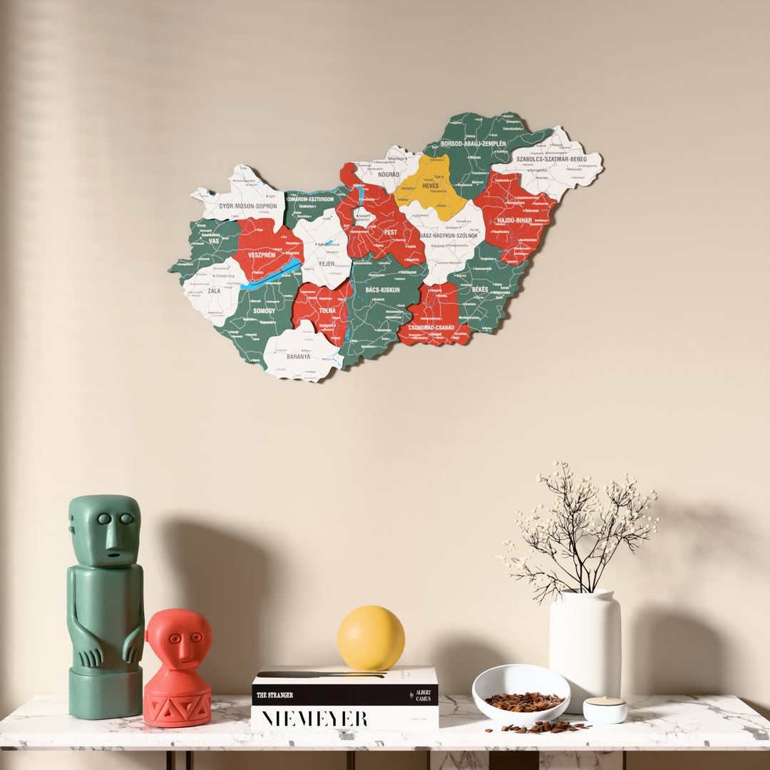 Flag colored Hungary wooden wall map above a marble console, front view