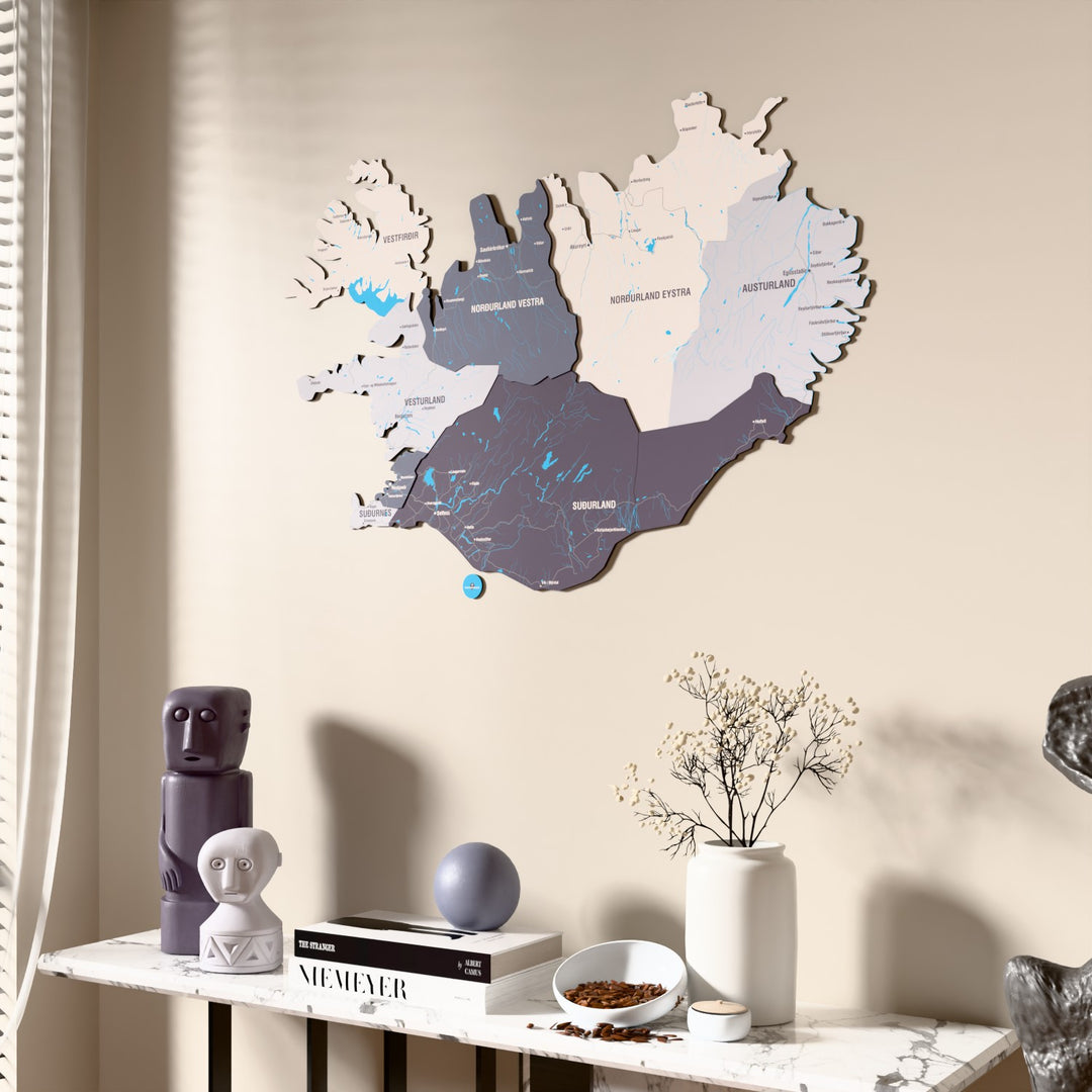Nimbus Iceland wooden wall map beside a sheer curtain, angled view