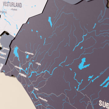 Close-up of the Nimbus Iceland wooden wall map with layered regions and printed names