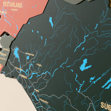 Close-up of the Sage Iceland wooden wall map with layered regions and printed names
