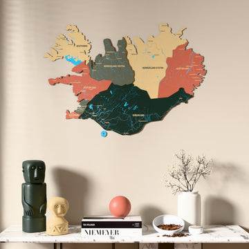 Sage Iceland wooden wall map above a marble console, front view