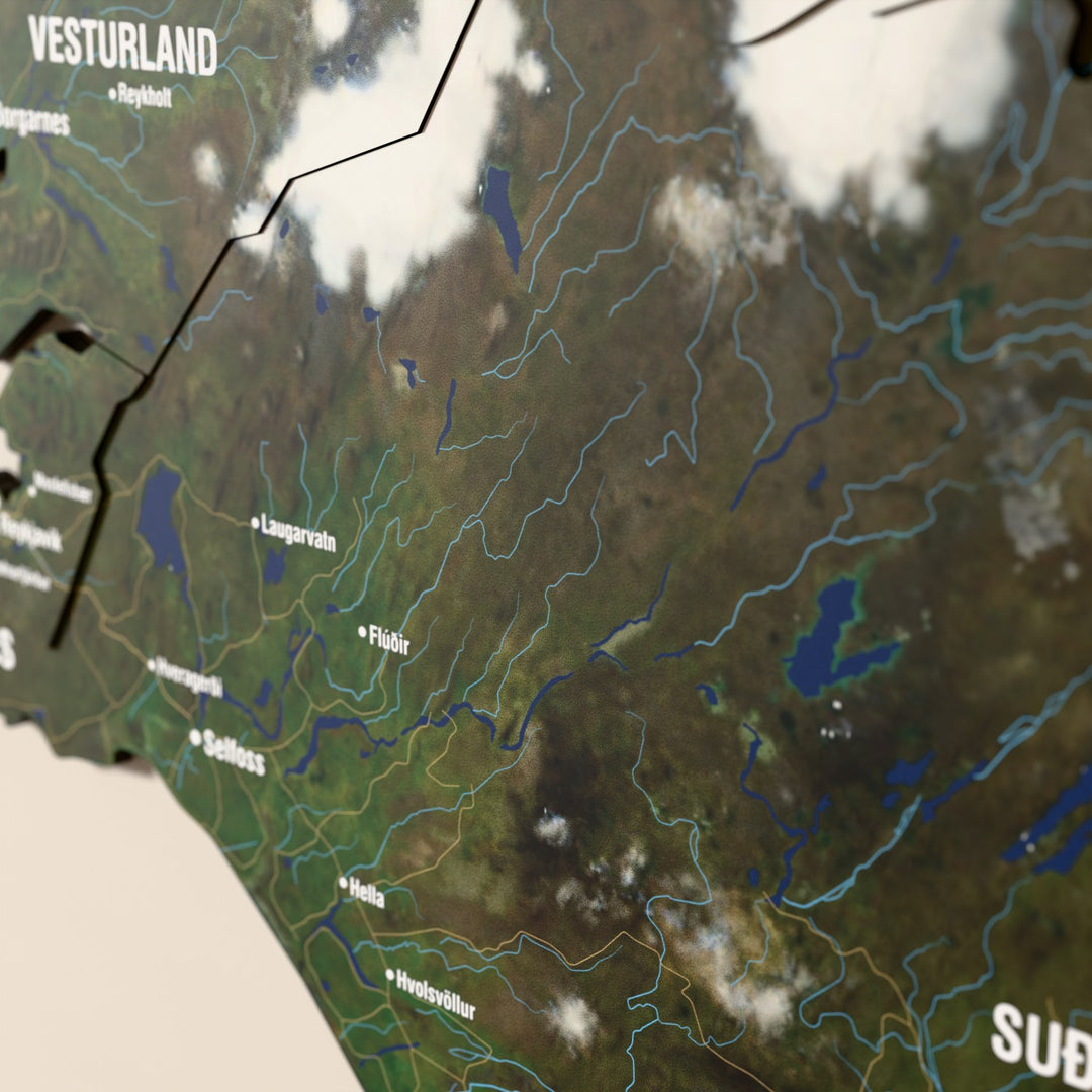 Close-up of the Satellite Iceland wooden wall map with layered regions and printed names