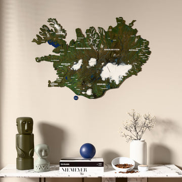Satellite Iceland wooden wall map above a marble console, front view