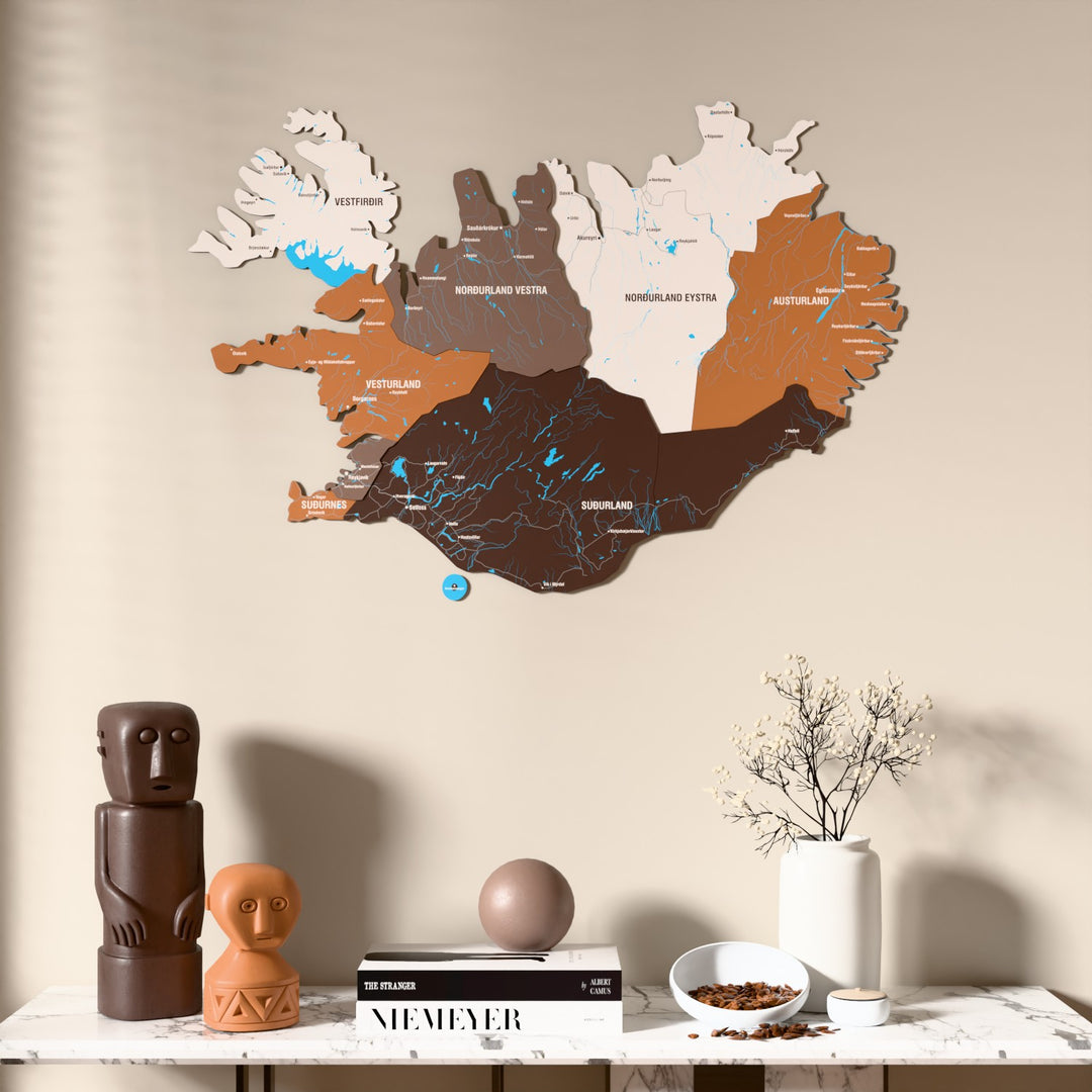 Soil Iceland wooden wall map above a marble console, front view