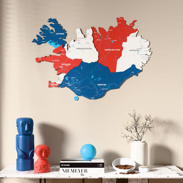 Flag colored Iceland wooden wall map above a marble console, front view