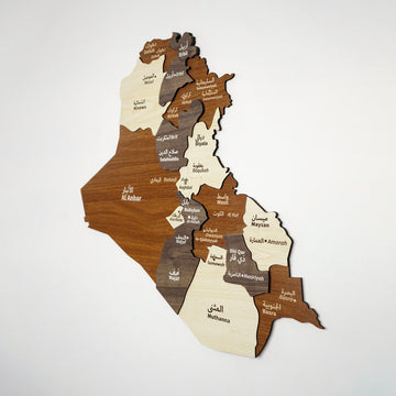 Large wooden Iraq map from the right, showing Al Anbar, Baghdad, Najaf and Basra governorate labels