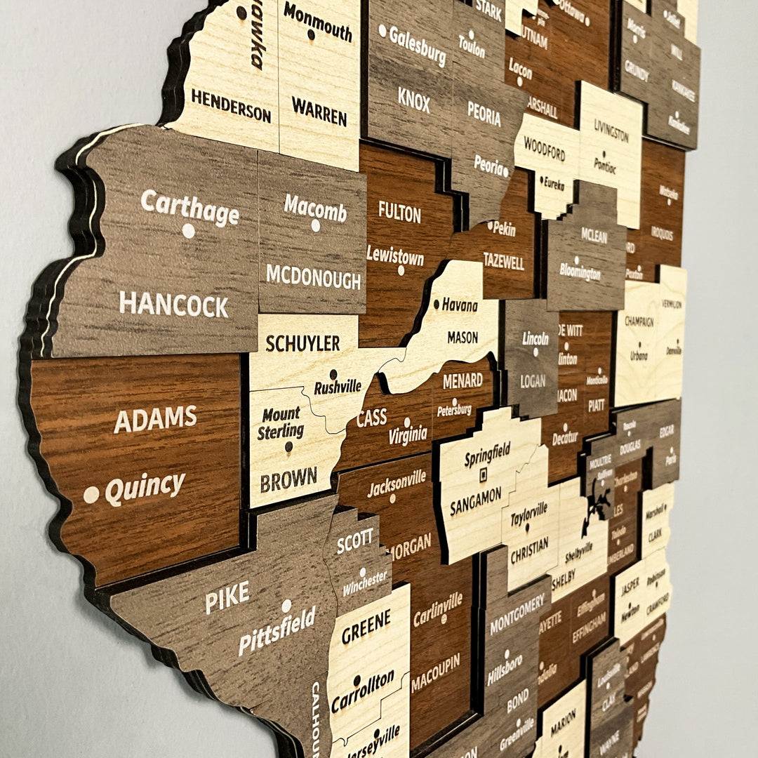 Close-up of the layered wooden Illinois map with Adams, Hancock, Pike and Sangamon county labels