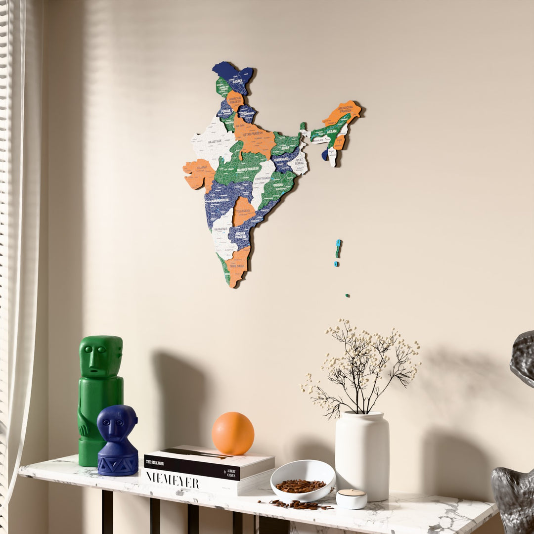 Flag colored India wooden wall map beside a sheer curtain, angled view
