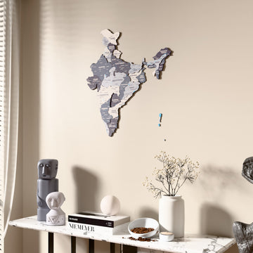 Nimbus India wooden wall map beside a sheer curtain, angled view