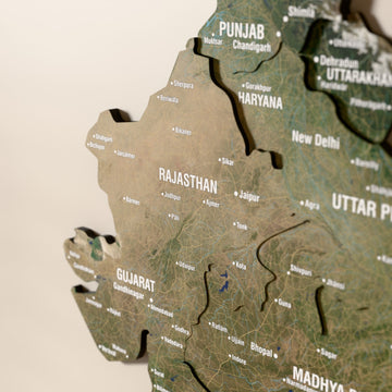 Close-up of the Satellite India wooden wall map with layered regions and printed names