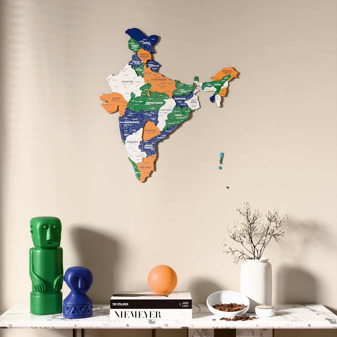 Flag colored India wooden wall map above a marble console, front view