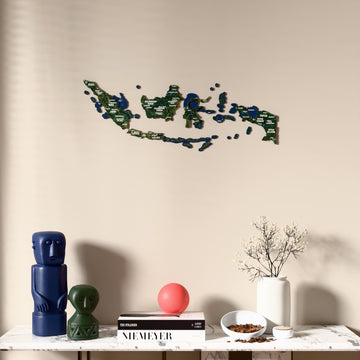 Satellite Indonesia wooden wall map above a marble console, front view